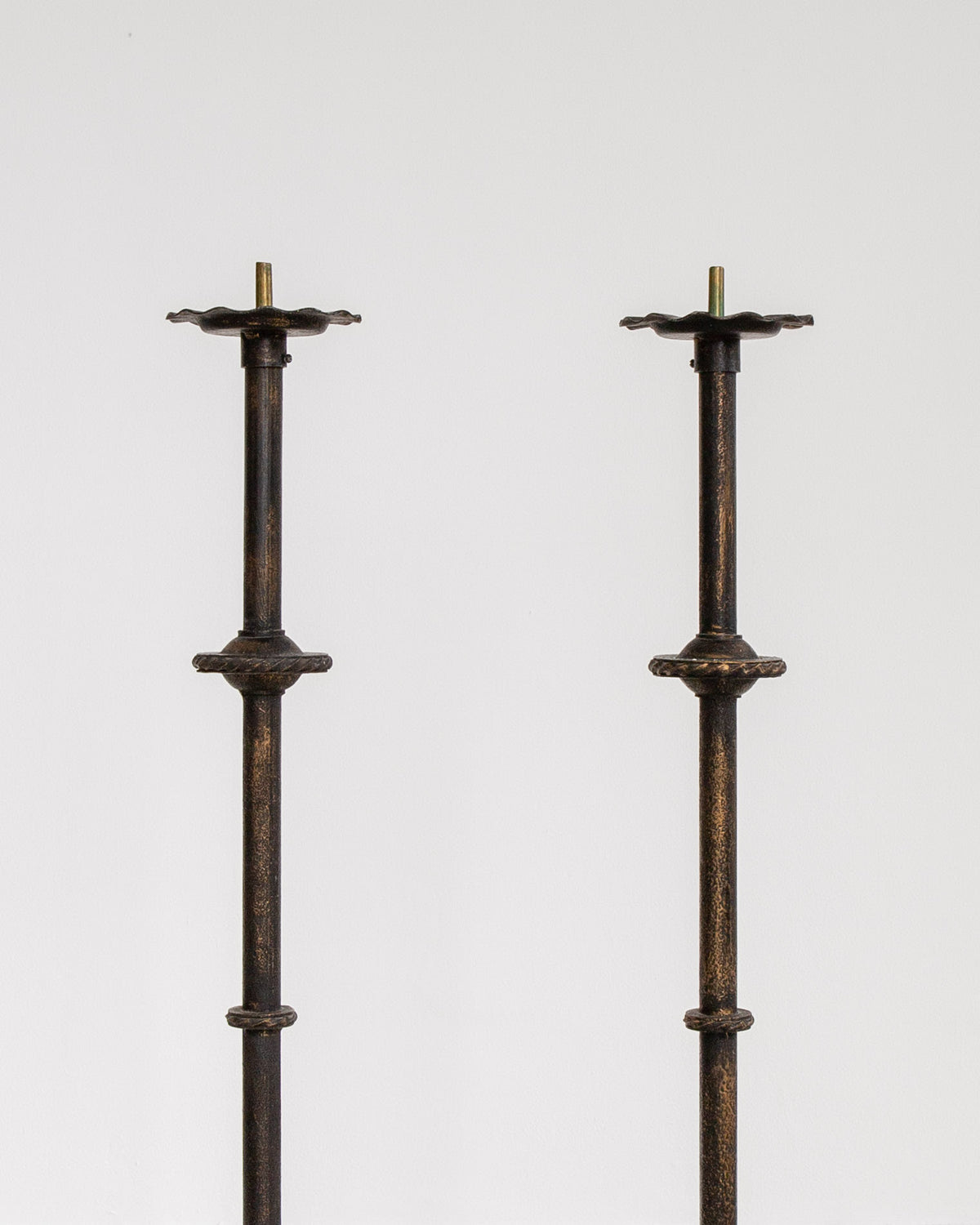 Pair of Monumental Cast Iron Floor Candleholders by Böhlmarks, Sweden, 1930s — back view highlighting textured iron finish