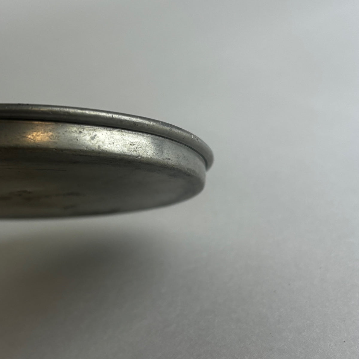 On hold Anna Petrus, Svenkst Stenn, Pewter Dish w/ Leger Figure — side angle