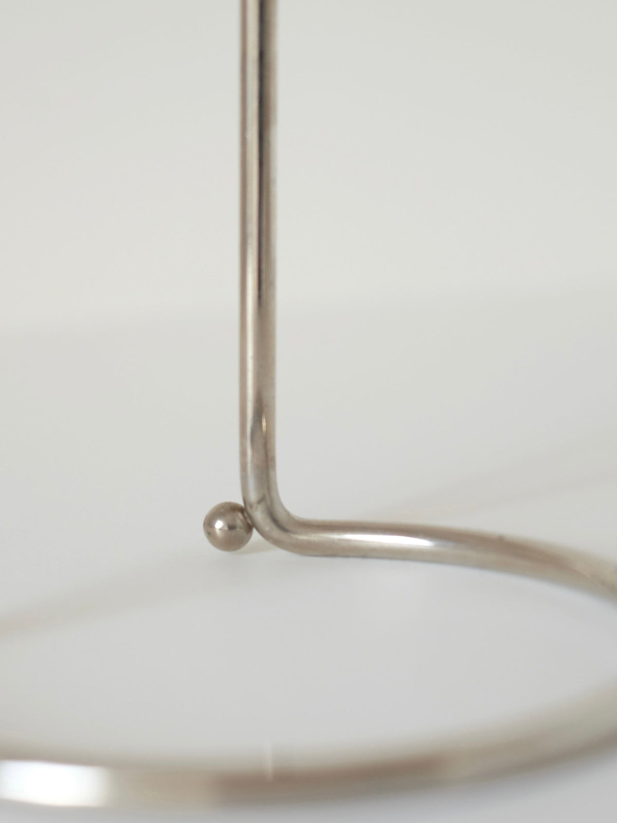 WMF Candle Holder — back view highlighting metal structure and base
