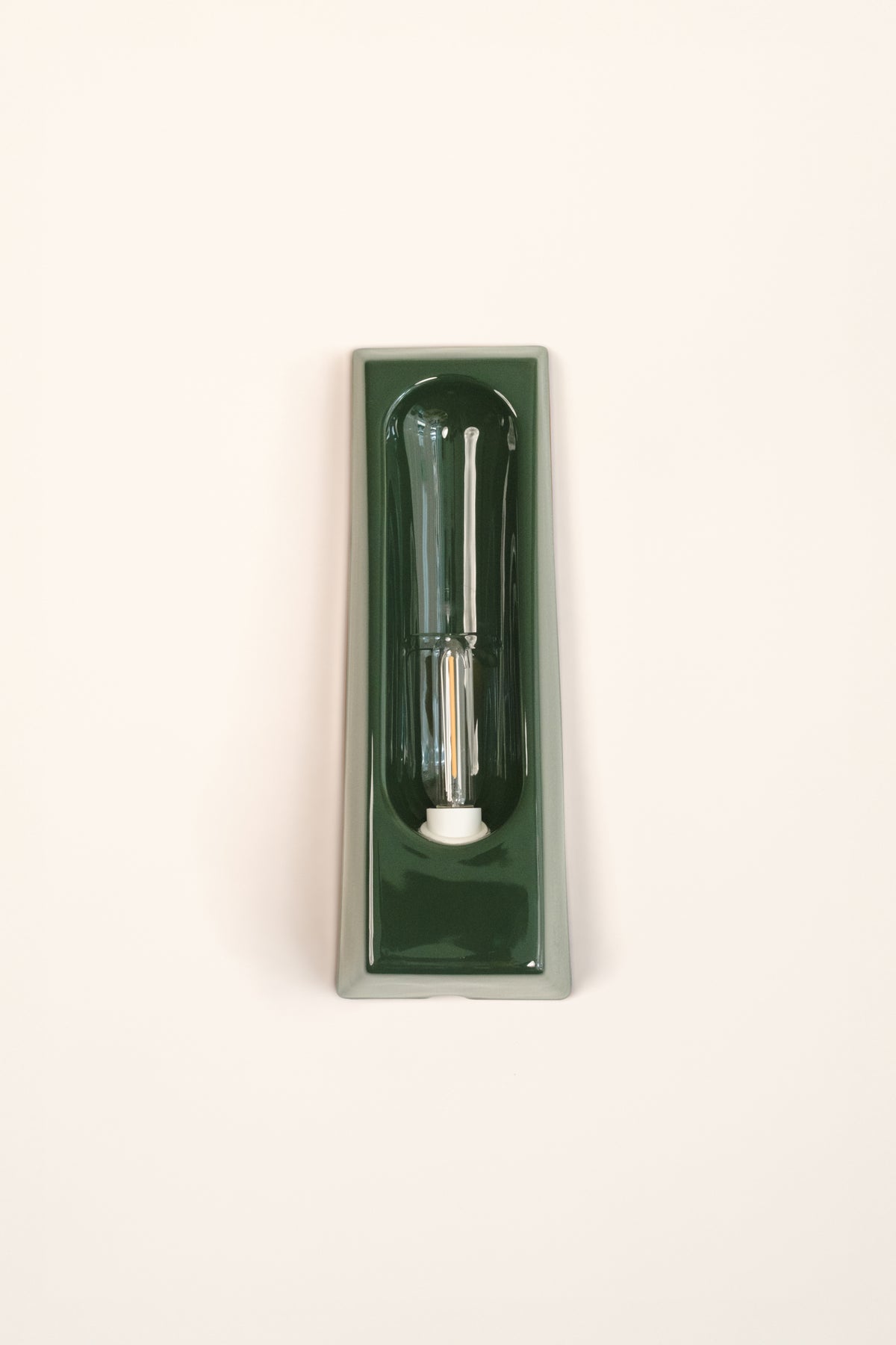 Alcove Verde — side angle showing glossy green ceramic finish