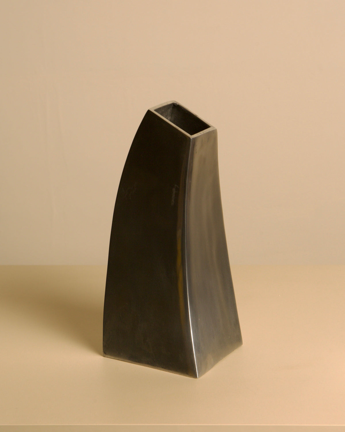 Corne vase in cast aluminum by Treaptyque | The Oblist — modern metallic finish