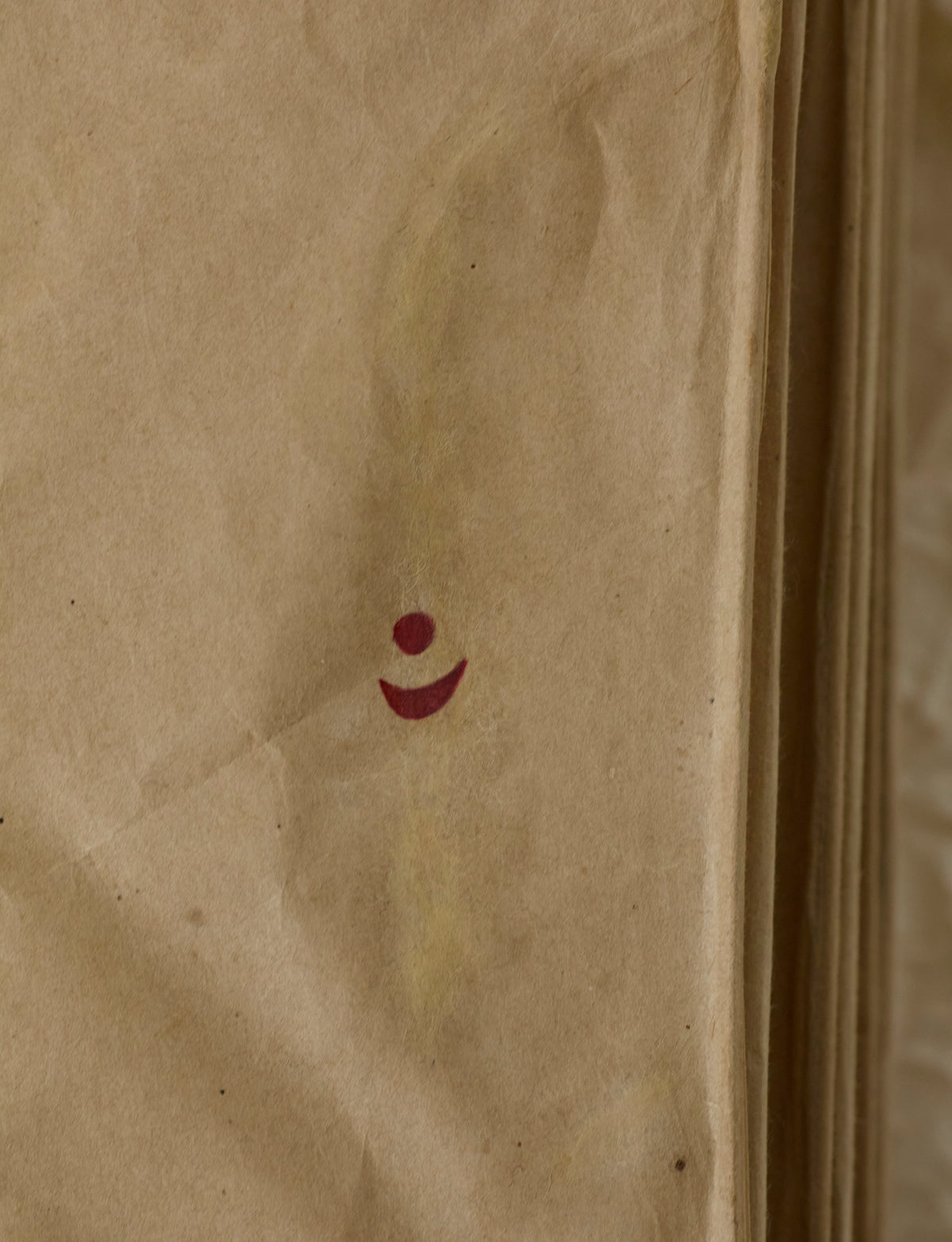 Rare Early Isamu Noguchi Akari 30P Pendant Light Sculpture Circa 1971 — close-up of textured paper with red design