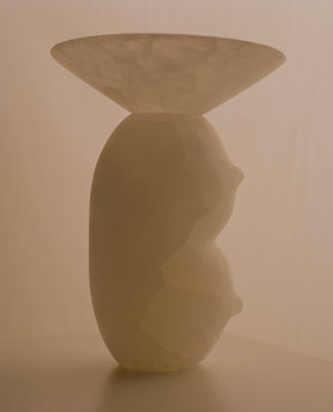 CLELIA WHITE ONYX SCULPTURAL VASE — lifestyle setting