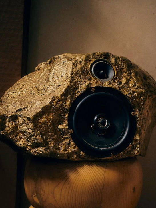 Bronze Singing-Stone MDL. C. Speaker — back view showing textured bronze finish