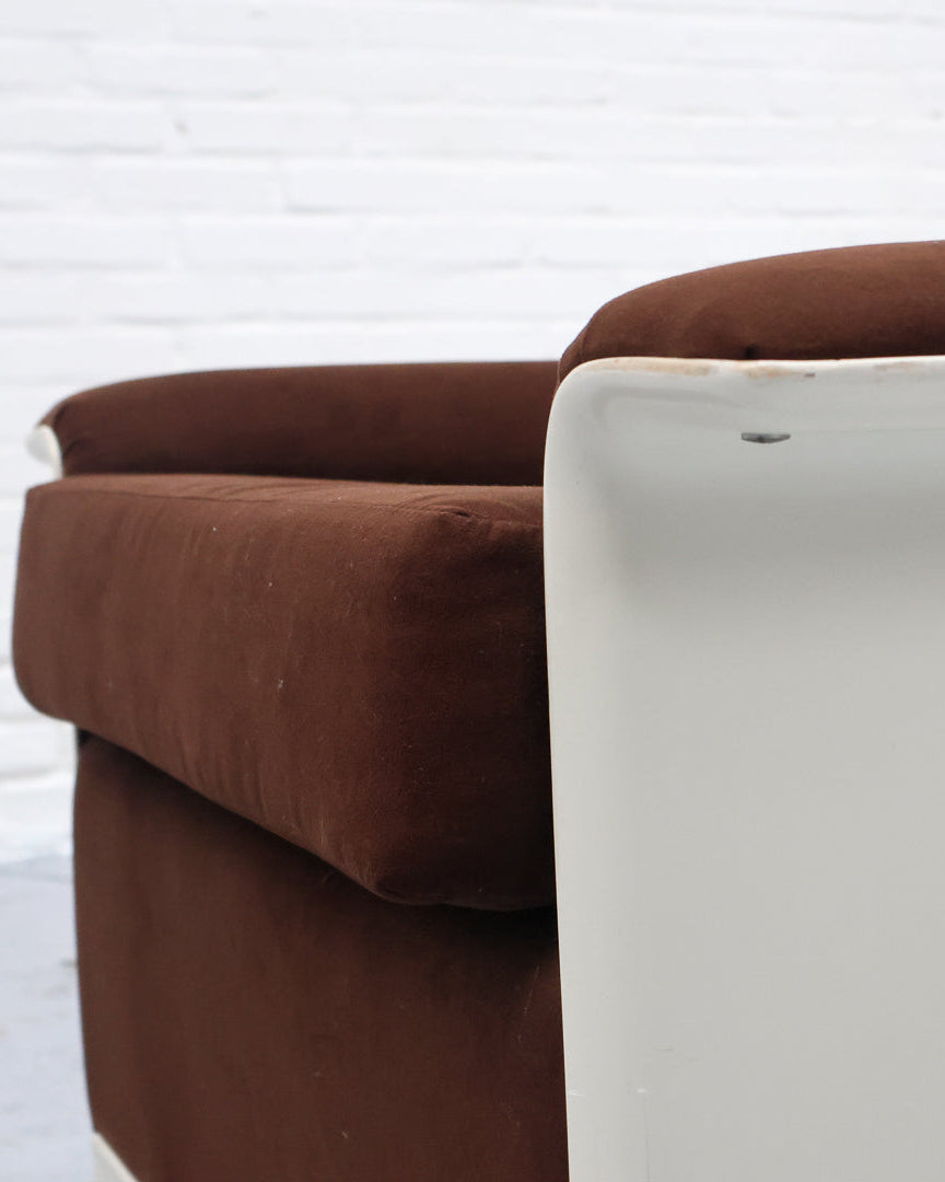 Brown velvet cushion detail of Dieter Rams 620 armchair with white frame
