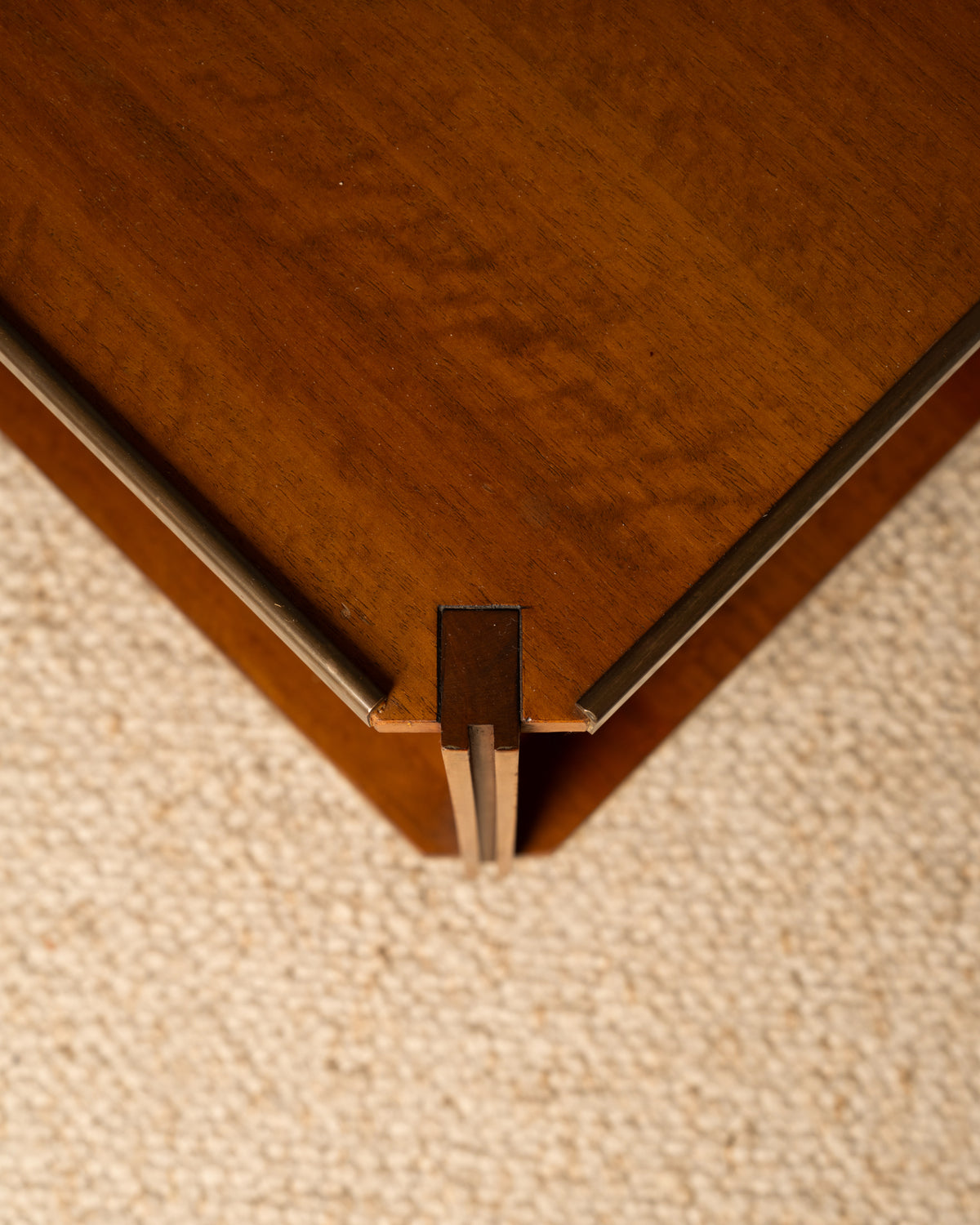 Corner detail of Zanuso walnut coffee table showing joinery work