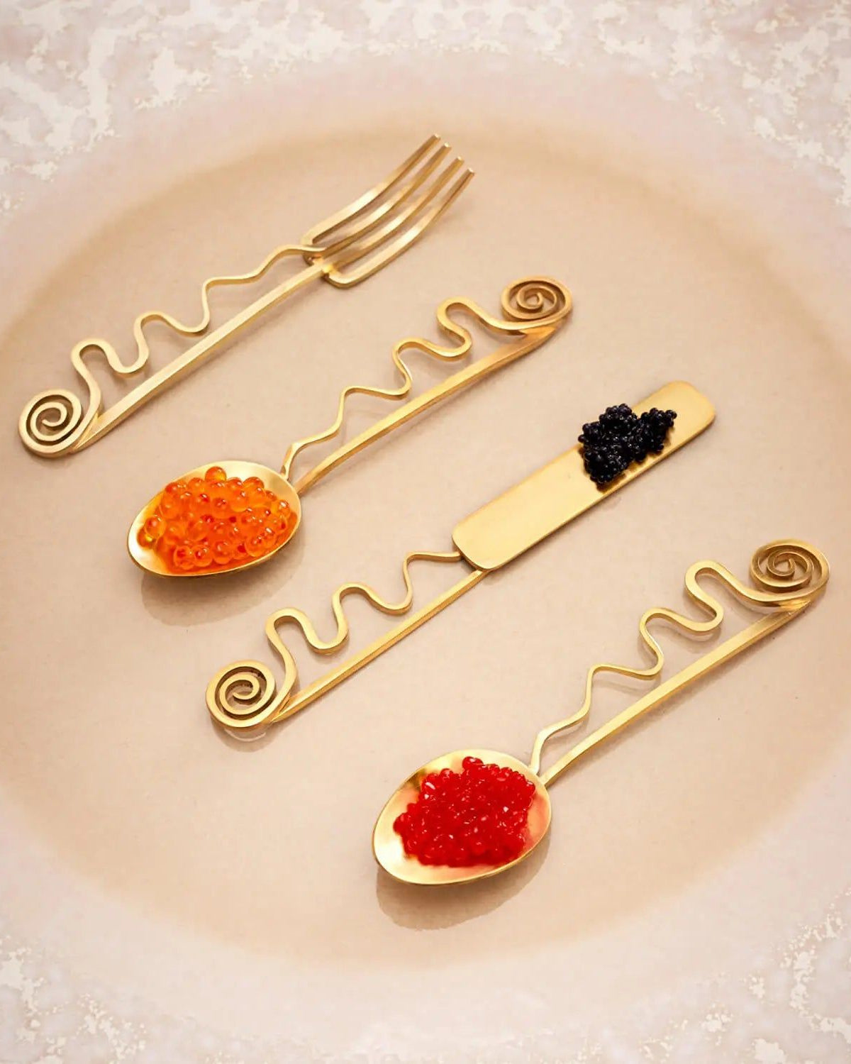 Set of 4 Spirale Cocktail Spoons — side angle showing gold metal design