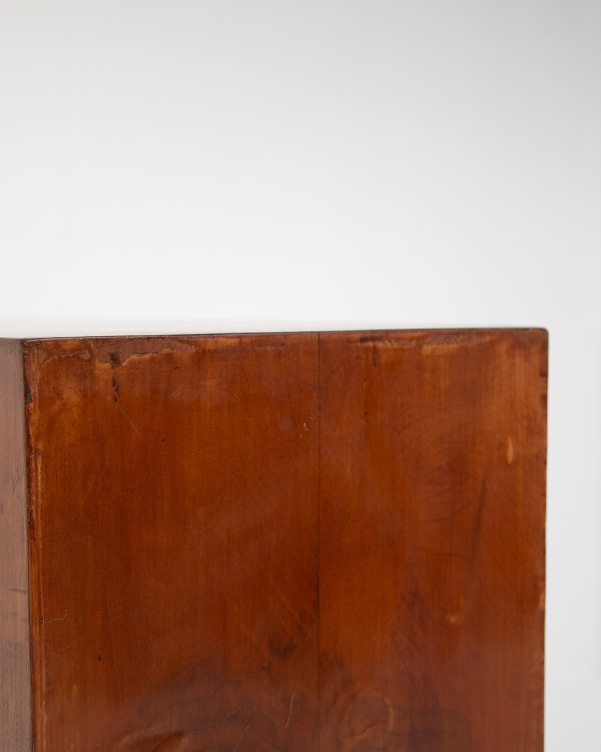 Art Deco cabinet rich wood grain and joinery detail view