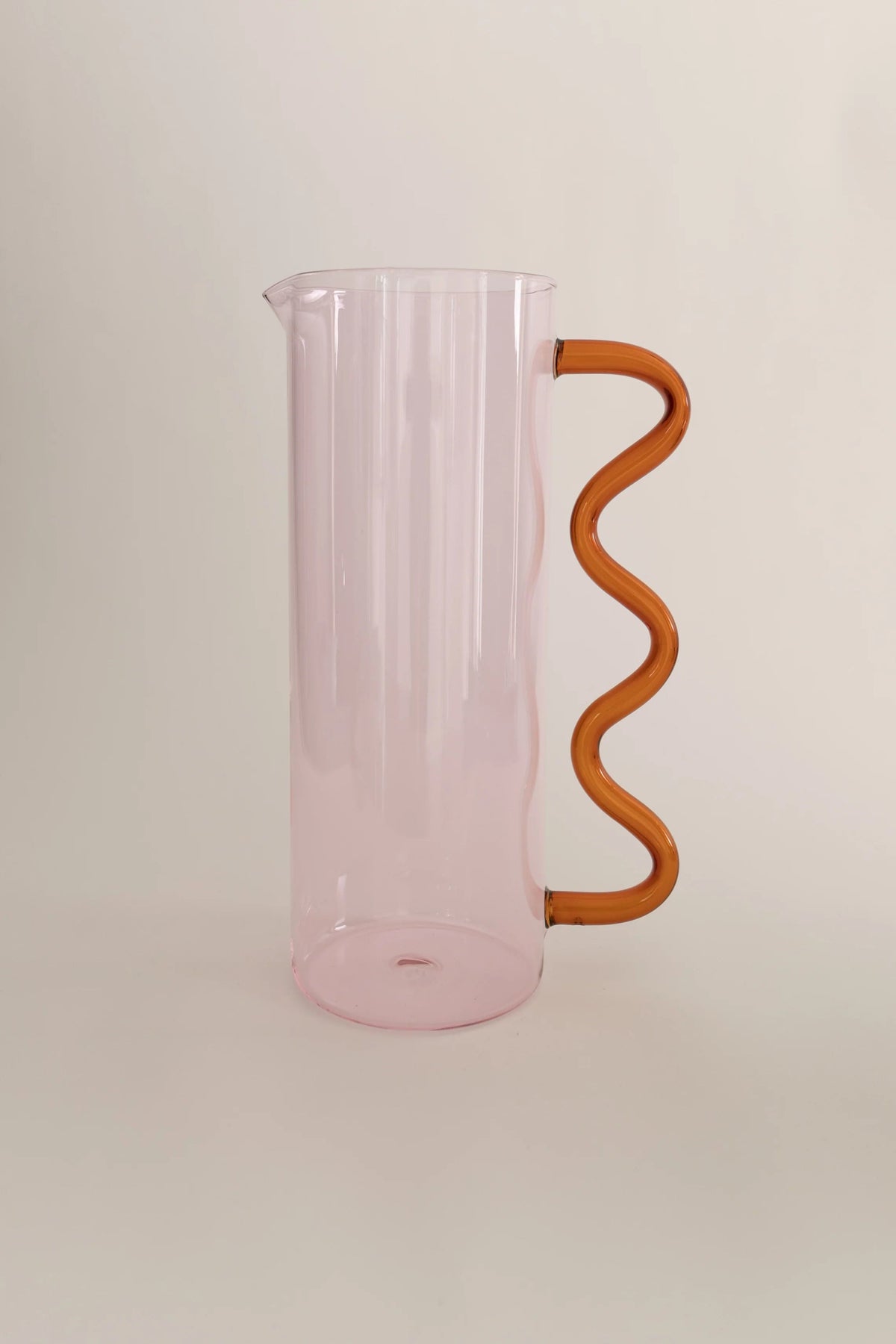 Wave Pitcher — side view highlighting pink acrylic and wavy handle