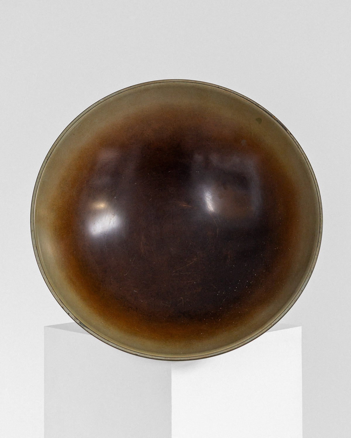 Interior view of Art Deco bronze bowl showing dark patina finish