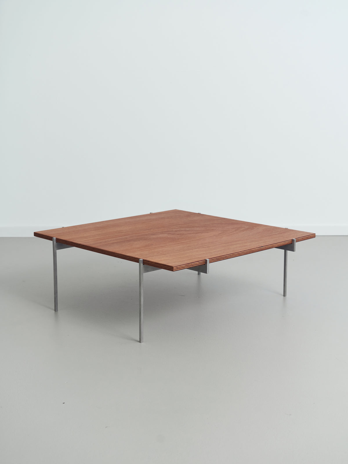 Lightweight Lounge Table — top view of wooden surface with metal legs