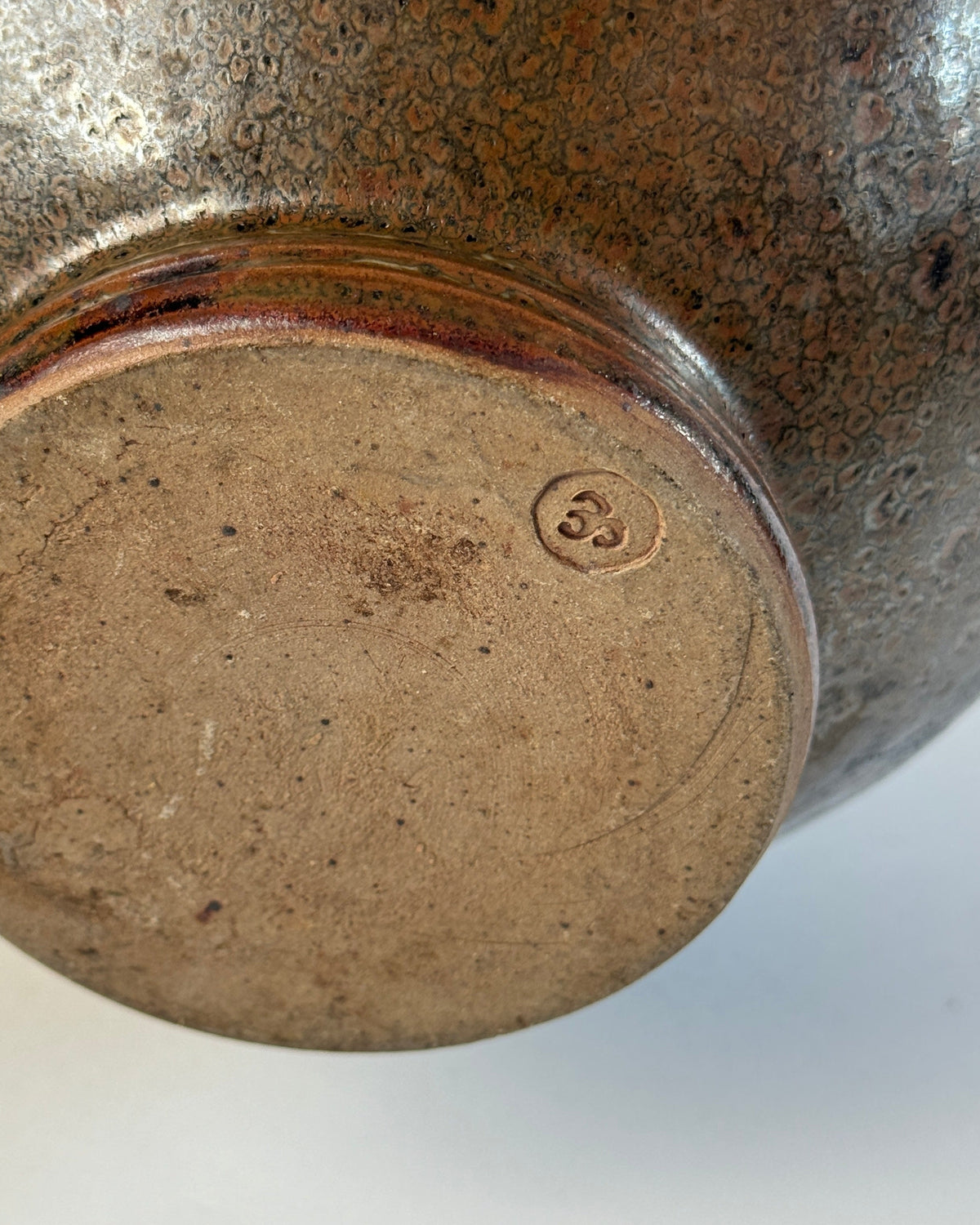 Maker's mark stamp on base of French Art Deco stoneware vase