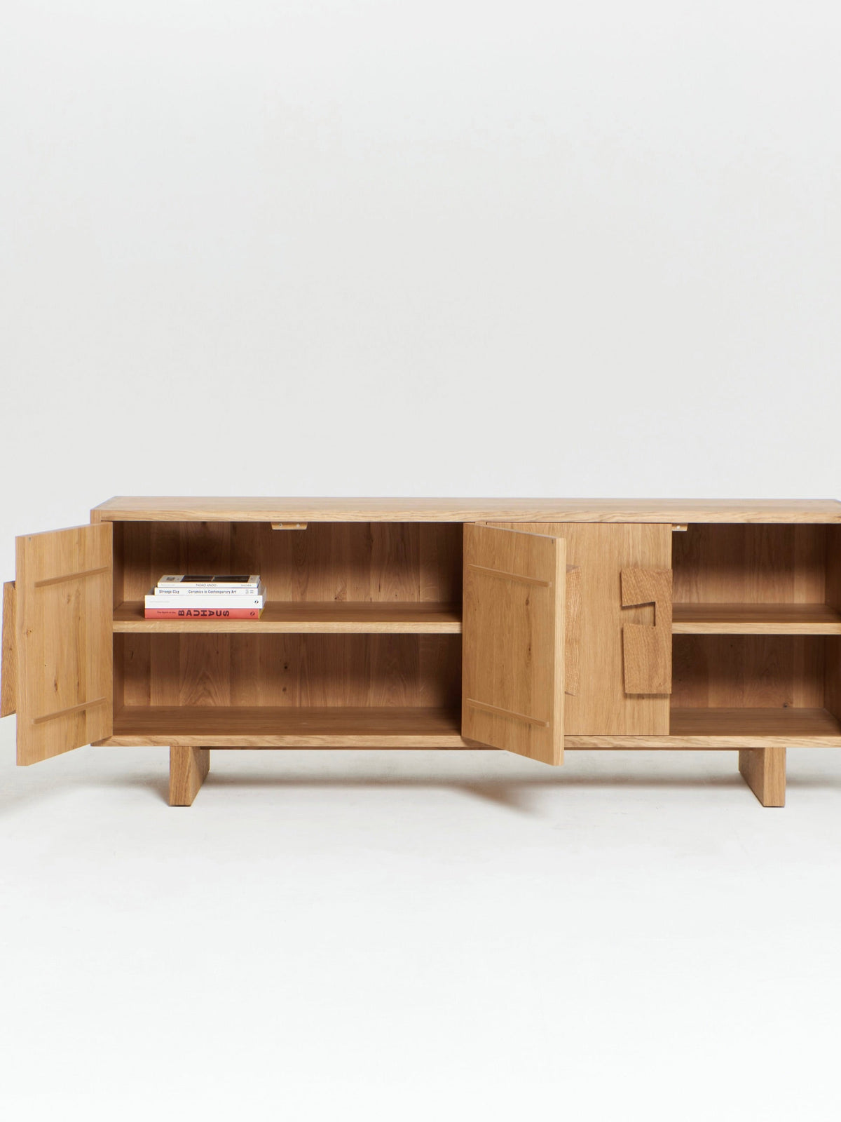 Douro Cabinet in Oak — side angle with open doors and shelves