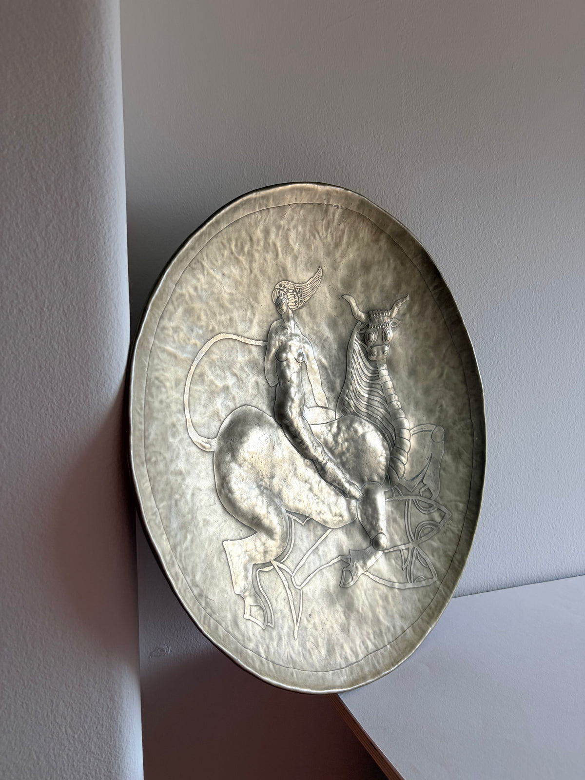 Brutalist large scale repousse wall plate, Spain, 1978 — side angle