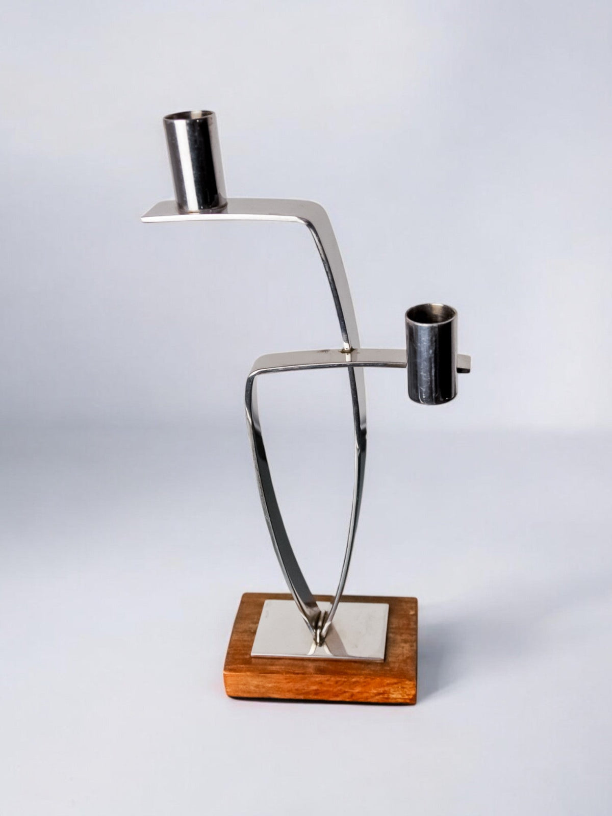 Candlestick in stainless steel and rosewood, 2 flames, Denmark, 1970's — lifestyle setting