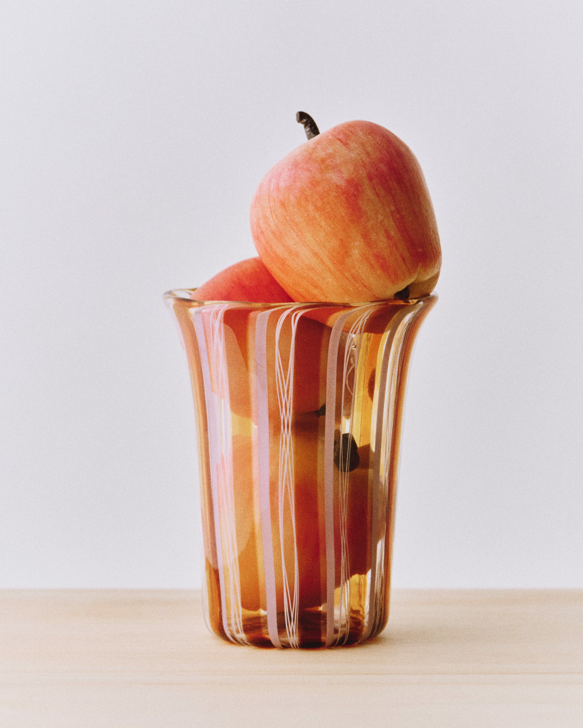 Clara Glasses - Set of four — back view with apples inside glass