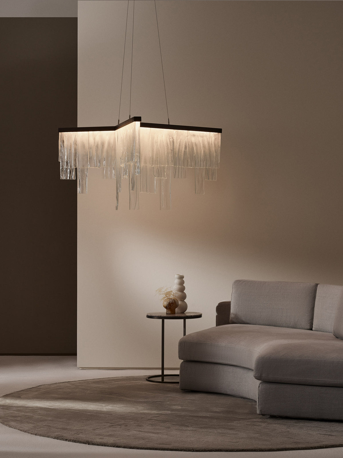 CASCATA Chandelier With Ceiling Rose — close-up of glass detail in modern living room