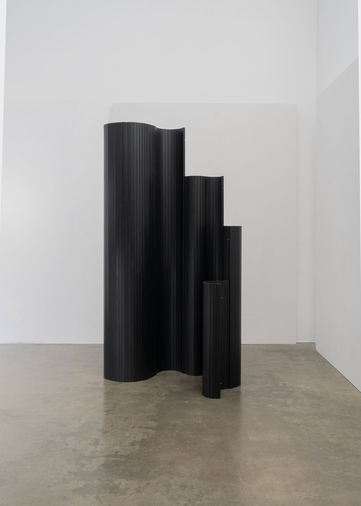 Sculptural Tambour Screen in Fumed Poplar by Tom Roberts — close-up of curved black wooden panels
