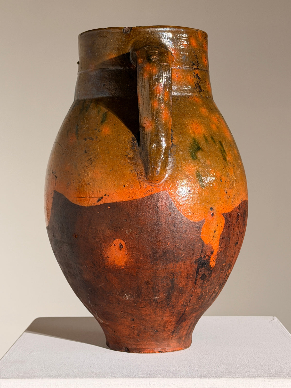 Ceramic Jar, French Folk Art, late 19th century — side view highlighting orange and black glaze