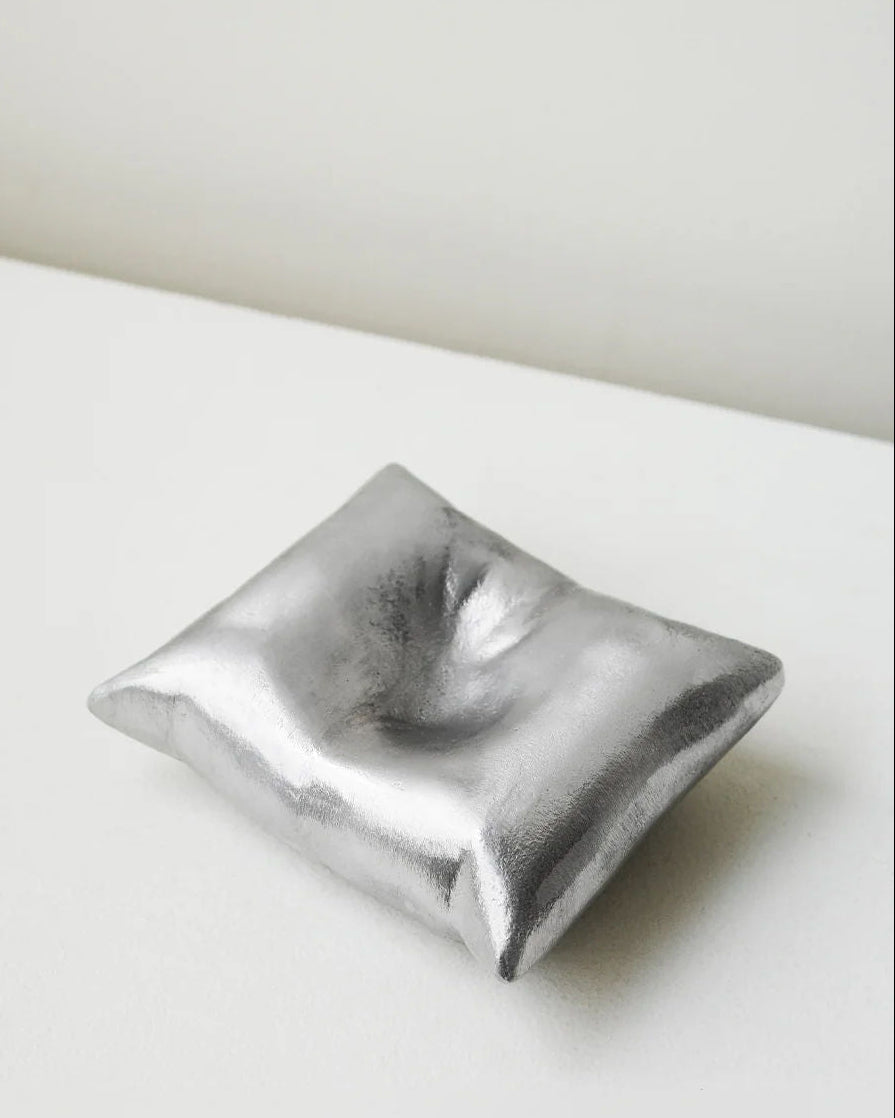 Bumped - Aluminium Cushion in Silver by Completedworks | The Oblist