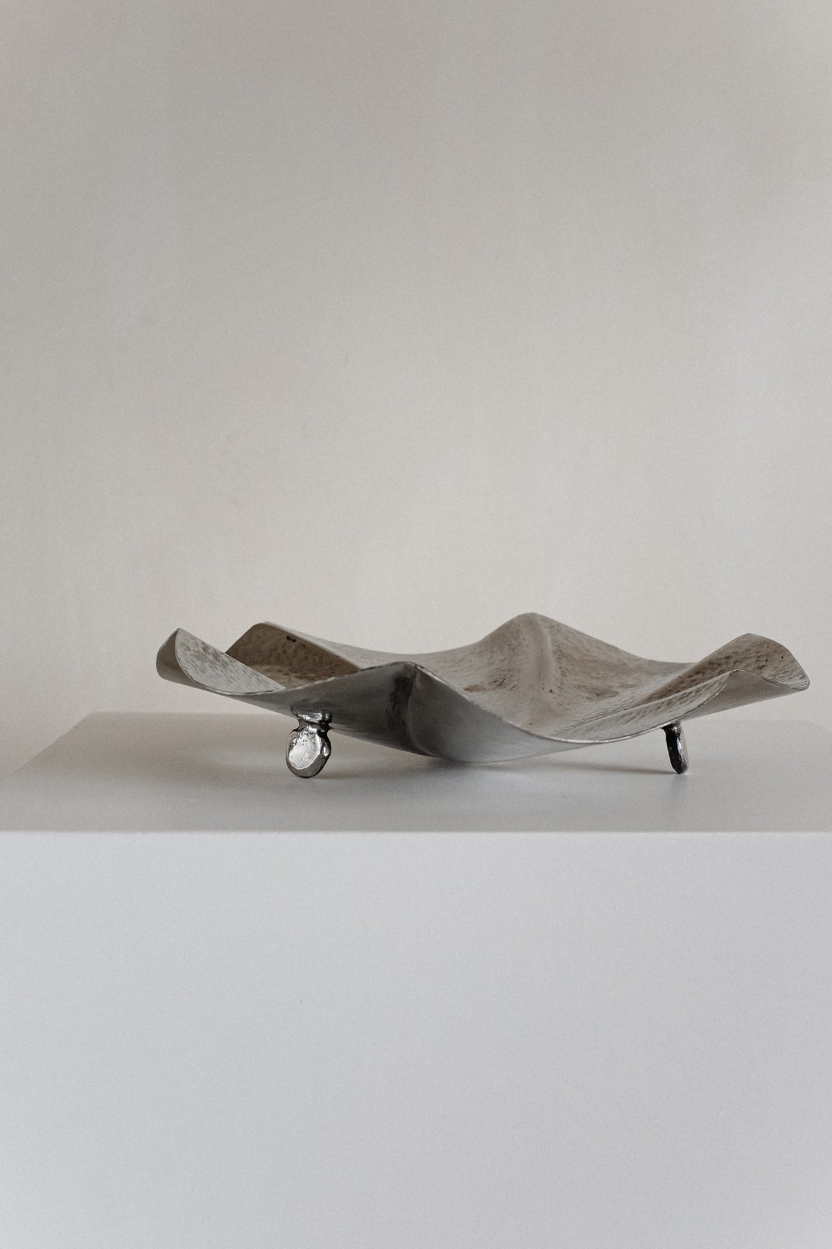 Decorative Footed Bowl — angled view on white pedestal