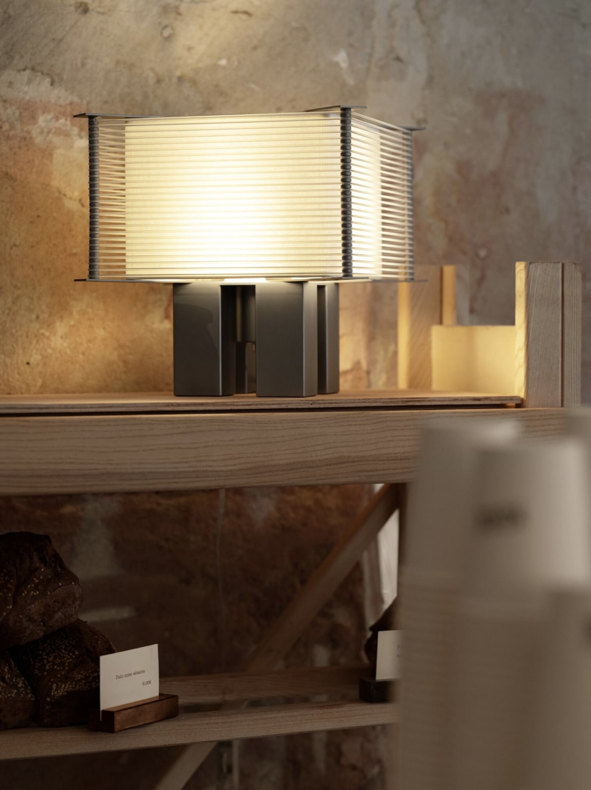 Boxing Ring Lamp - 081 — close-up of textured lamp shade on wooden shelf