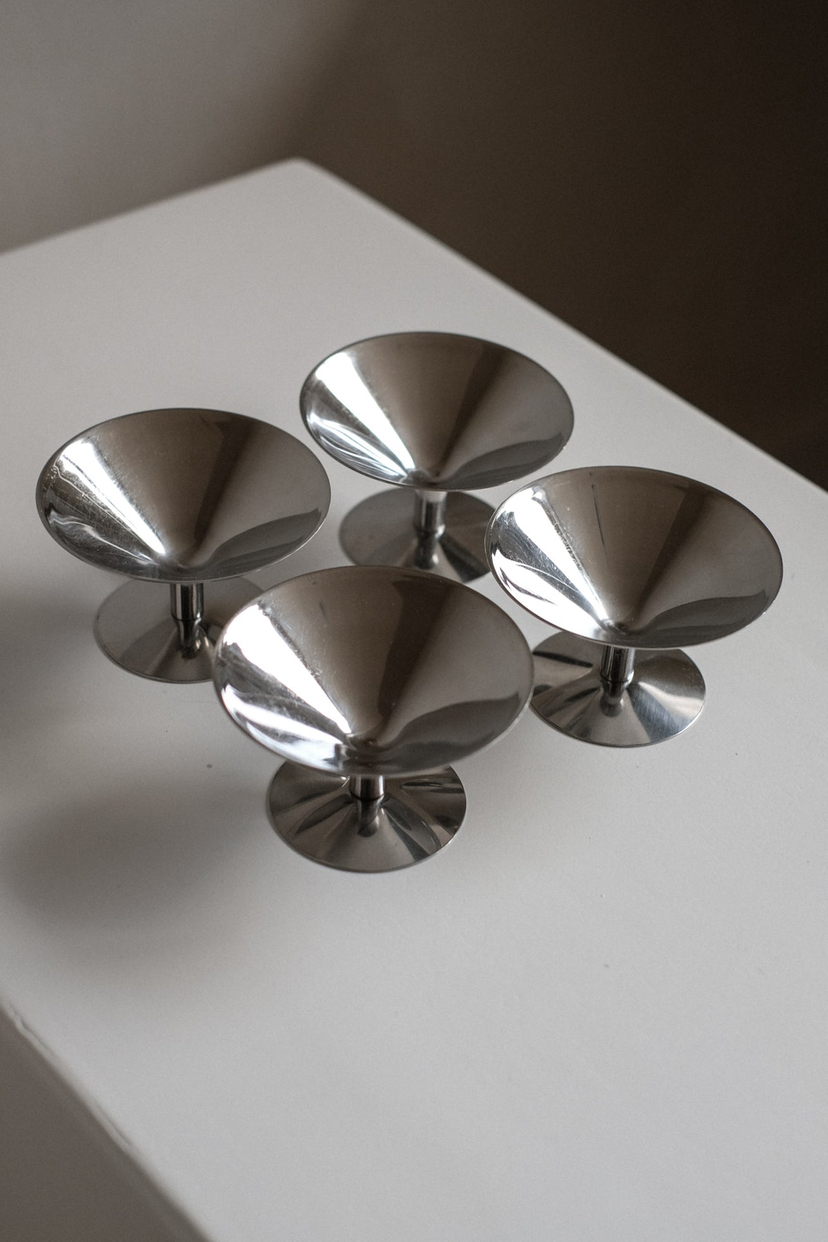 Set of Four Ice Coupes — angled view on white surface