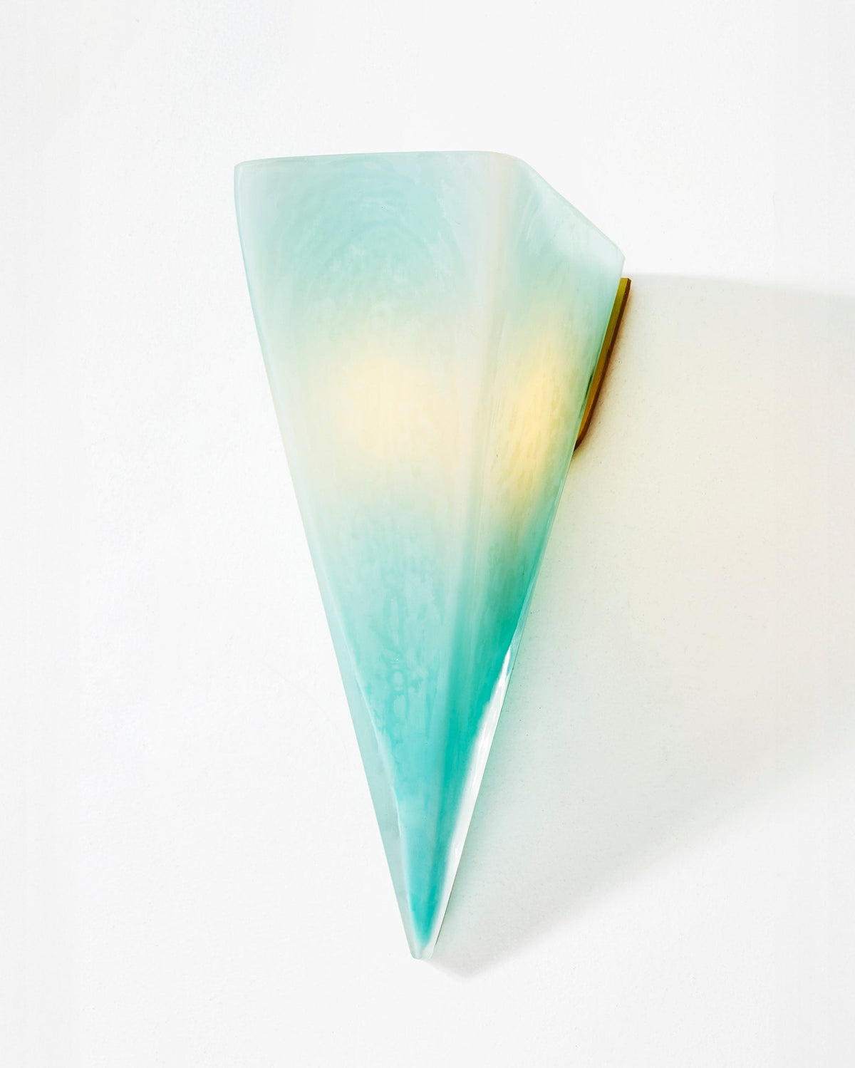Translucent quartz glass sconce with blue-green gradient detail