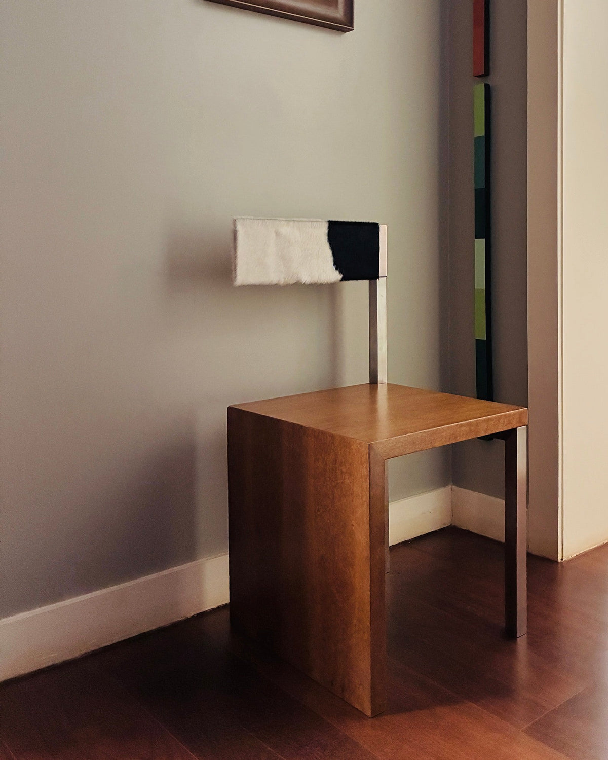 Stainless Steel and Brazilian Freijó Wood H04 Chair  — lifestyle setting