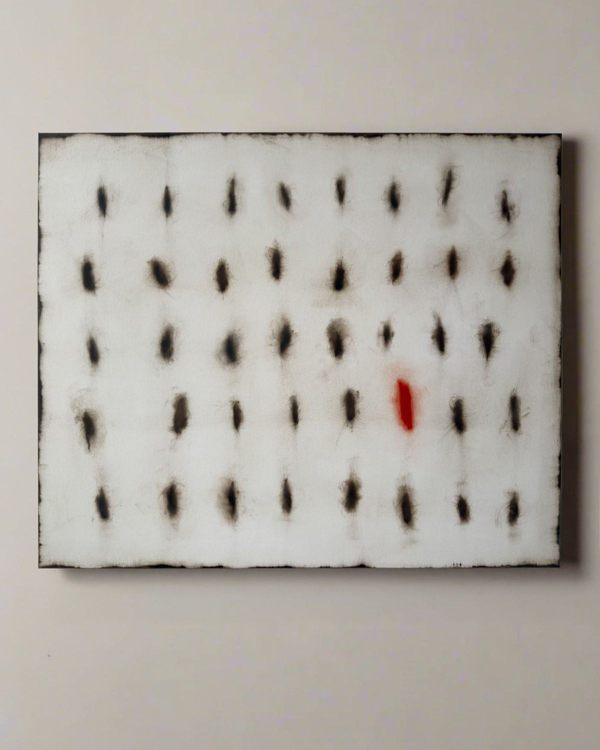 Contemporary oil painting with grid pattern of black marks and single red accent