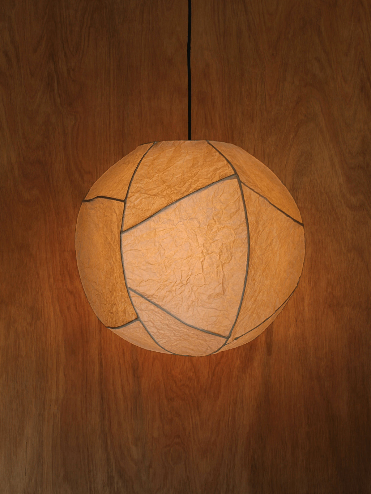 Sol' Pendant Light by Findere | The Oblist — handmade paper, warm amber color