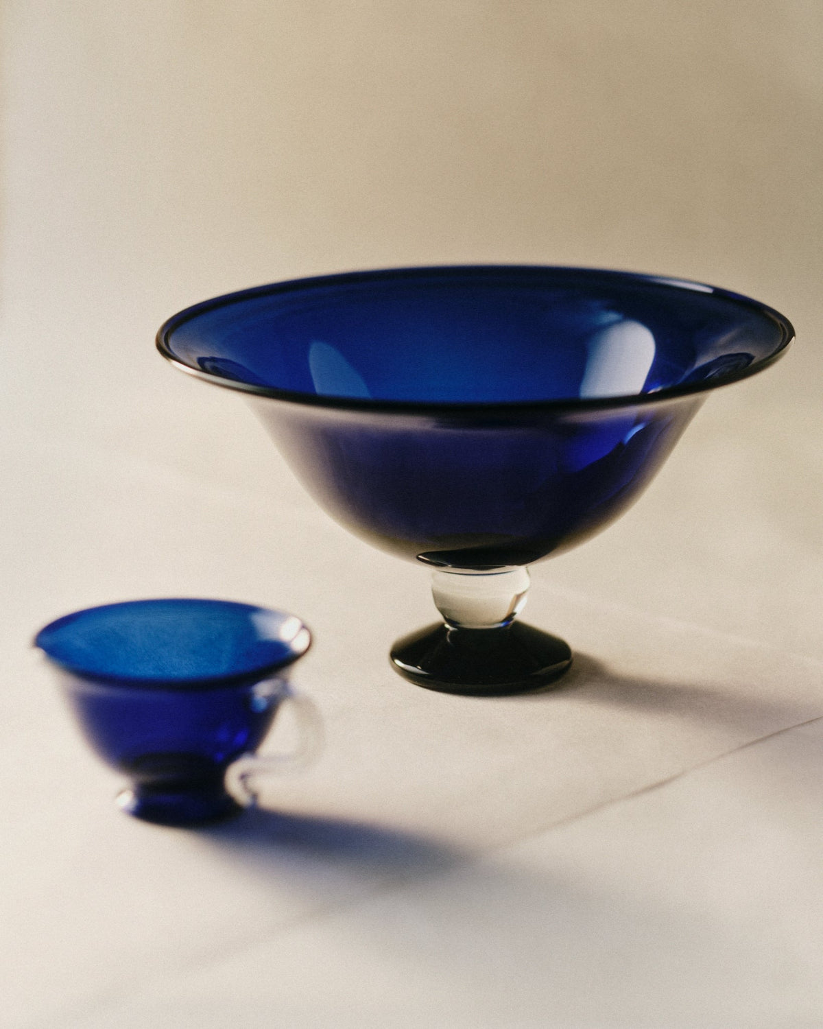 Fruit Bowl — side angle showing deep blue glass design