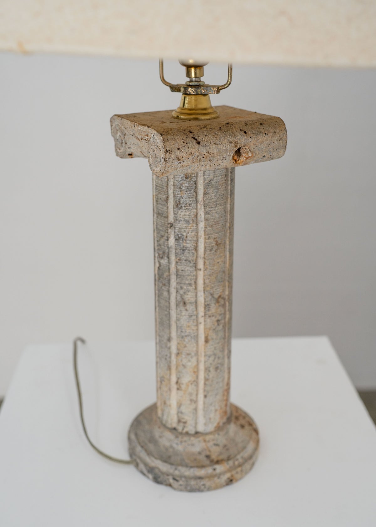 Postmodern Stone Column Table Lamp — top view of stone base and brass socket