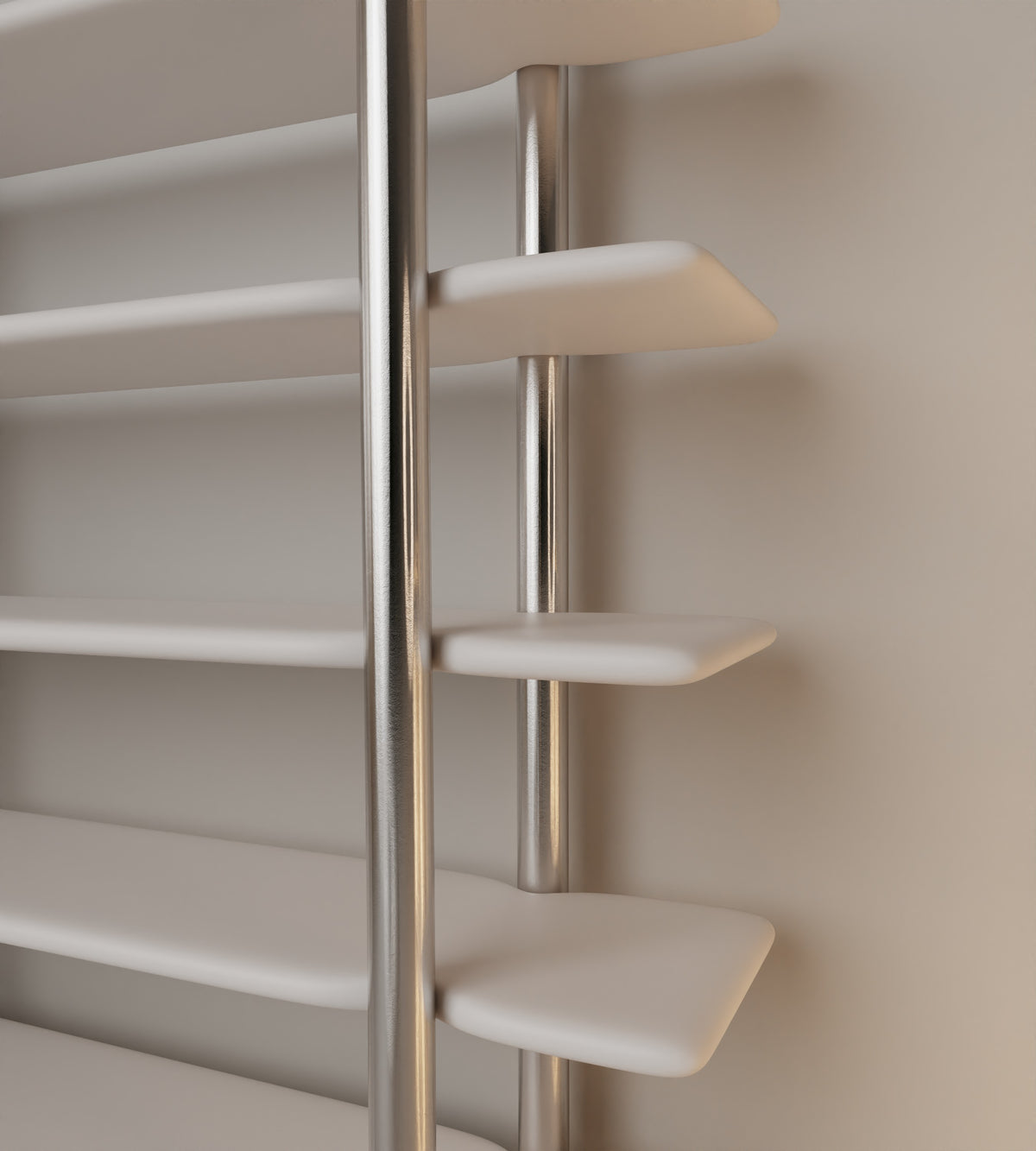 Close-up detail of stainless steel support rods on CANDY bookshelf