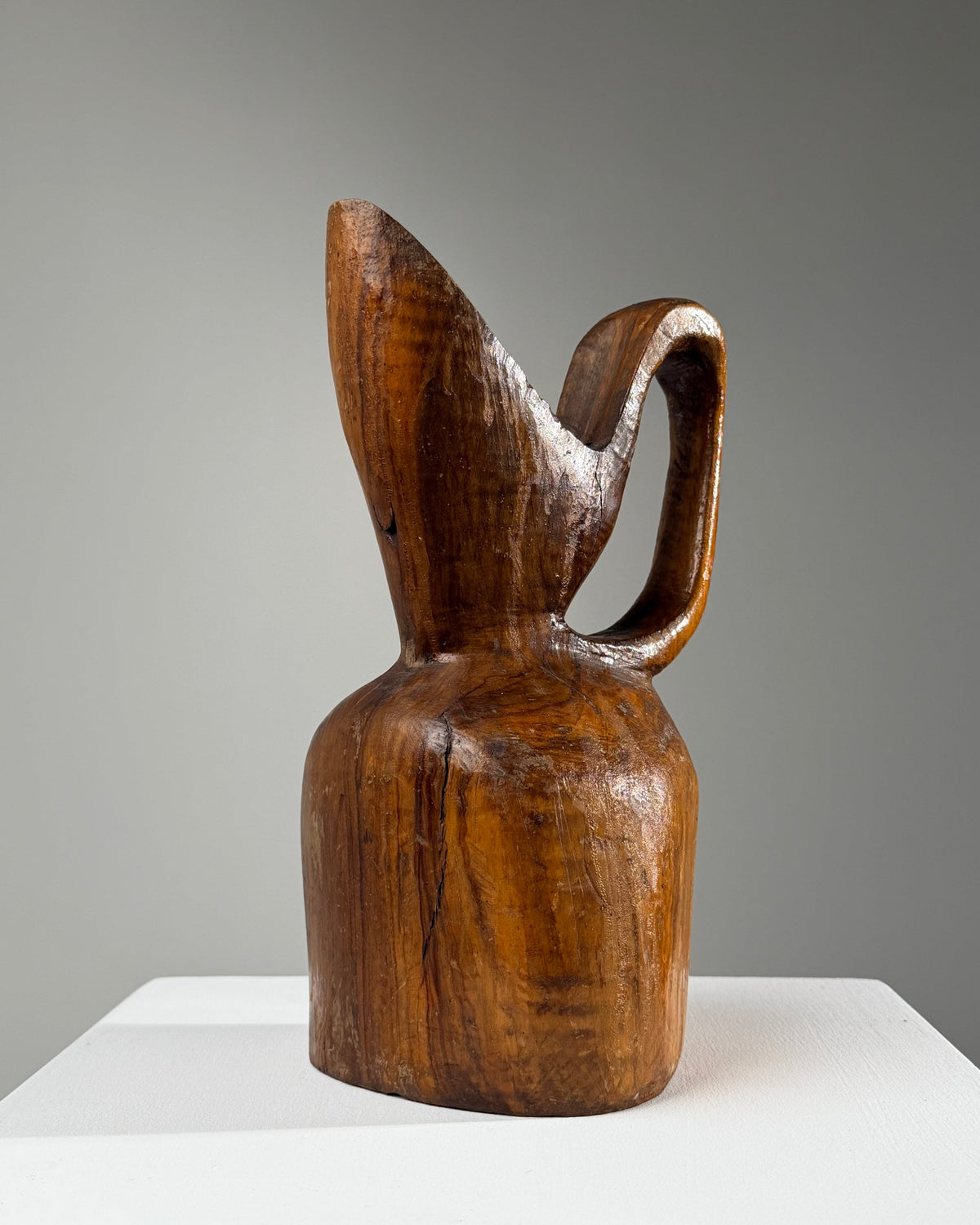 Carved olive wood pitcher, France, early 20th century.  — detail view