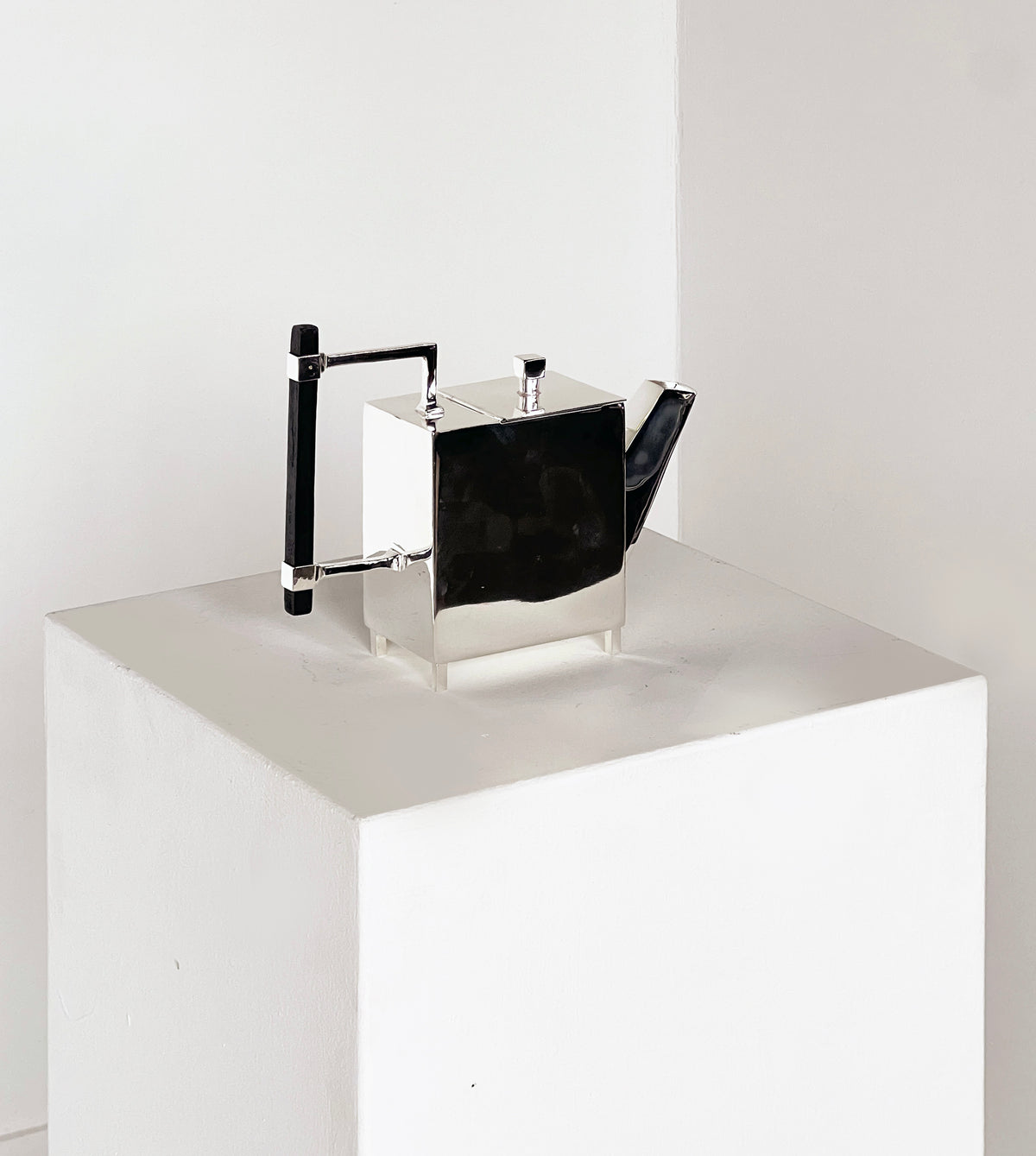 Christopher Dresser Square Ornate Teapot — angled view on white pedestal