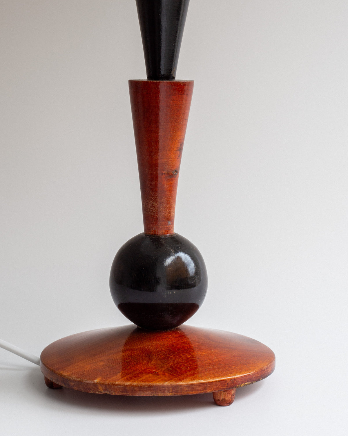 Art Deco wooden table lamp with spherical black accent, 1930s