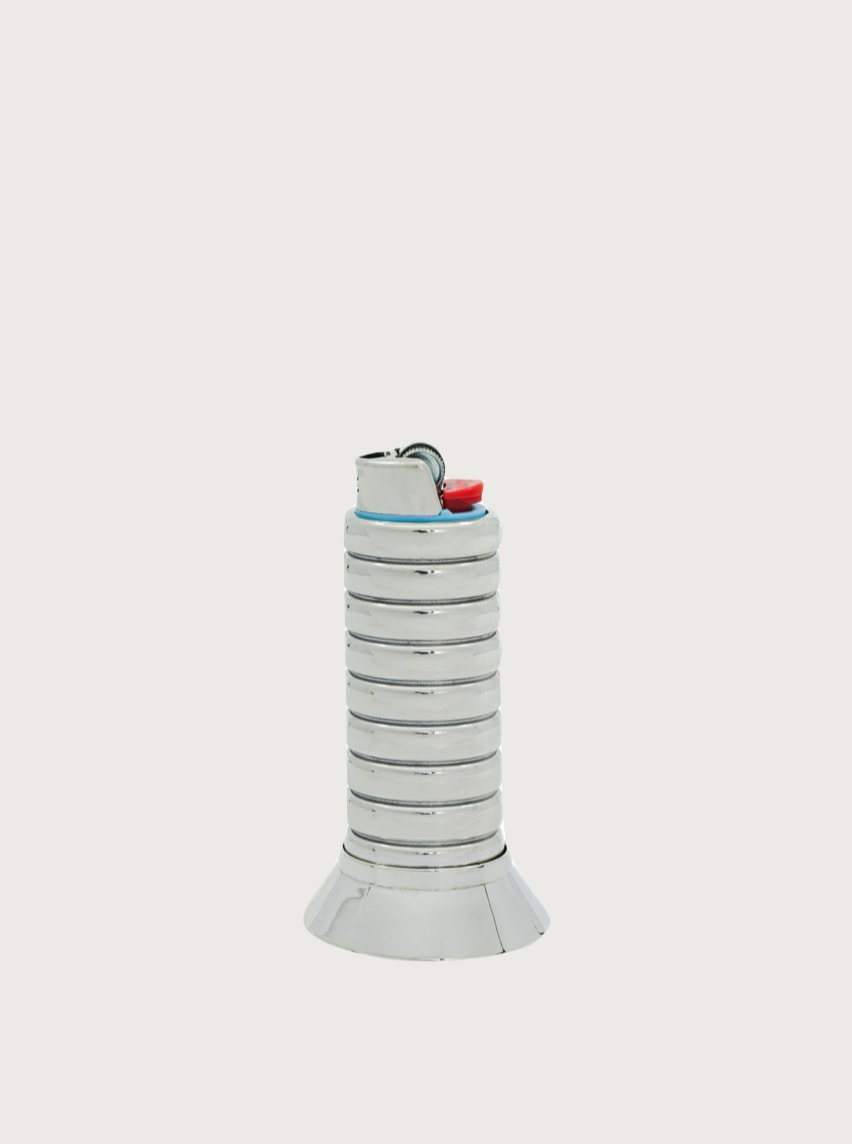 Gio Lighter Holder — angled view highlighting shiny metal finish