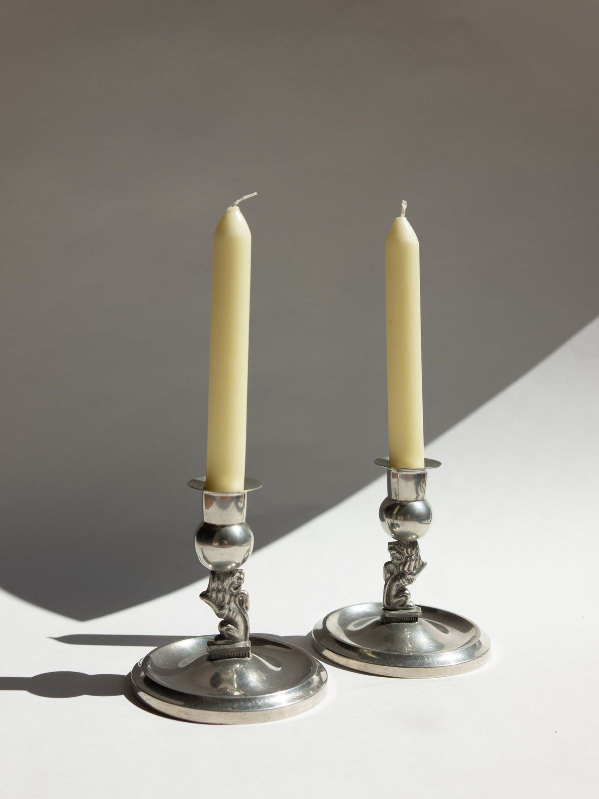 Pair of Swedish Grace Art Deco Pewter Lion Candlesticks by Eskilstuna Metallindustri, 1932 — detail view