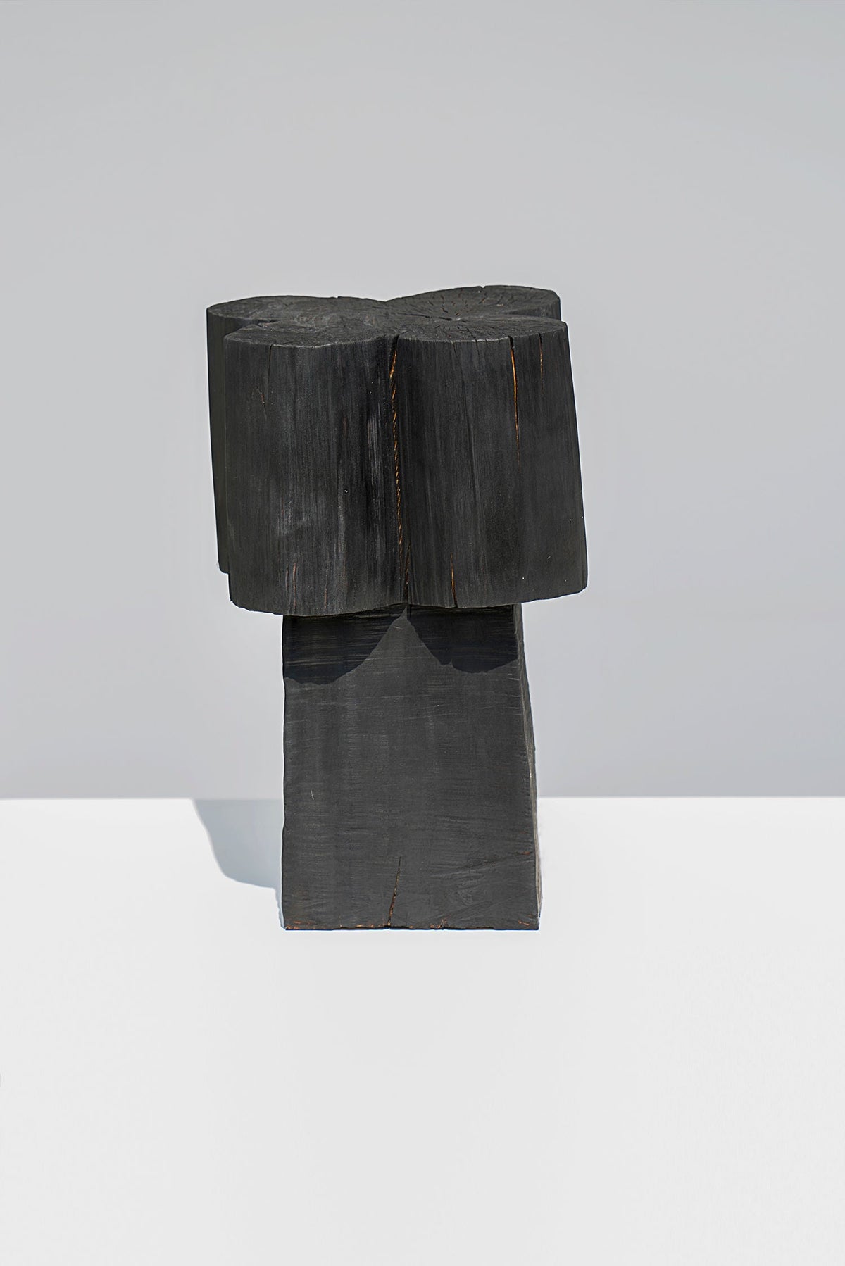 Burnt Black Coffee Tables/Stools — in context