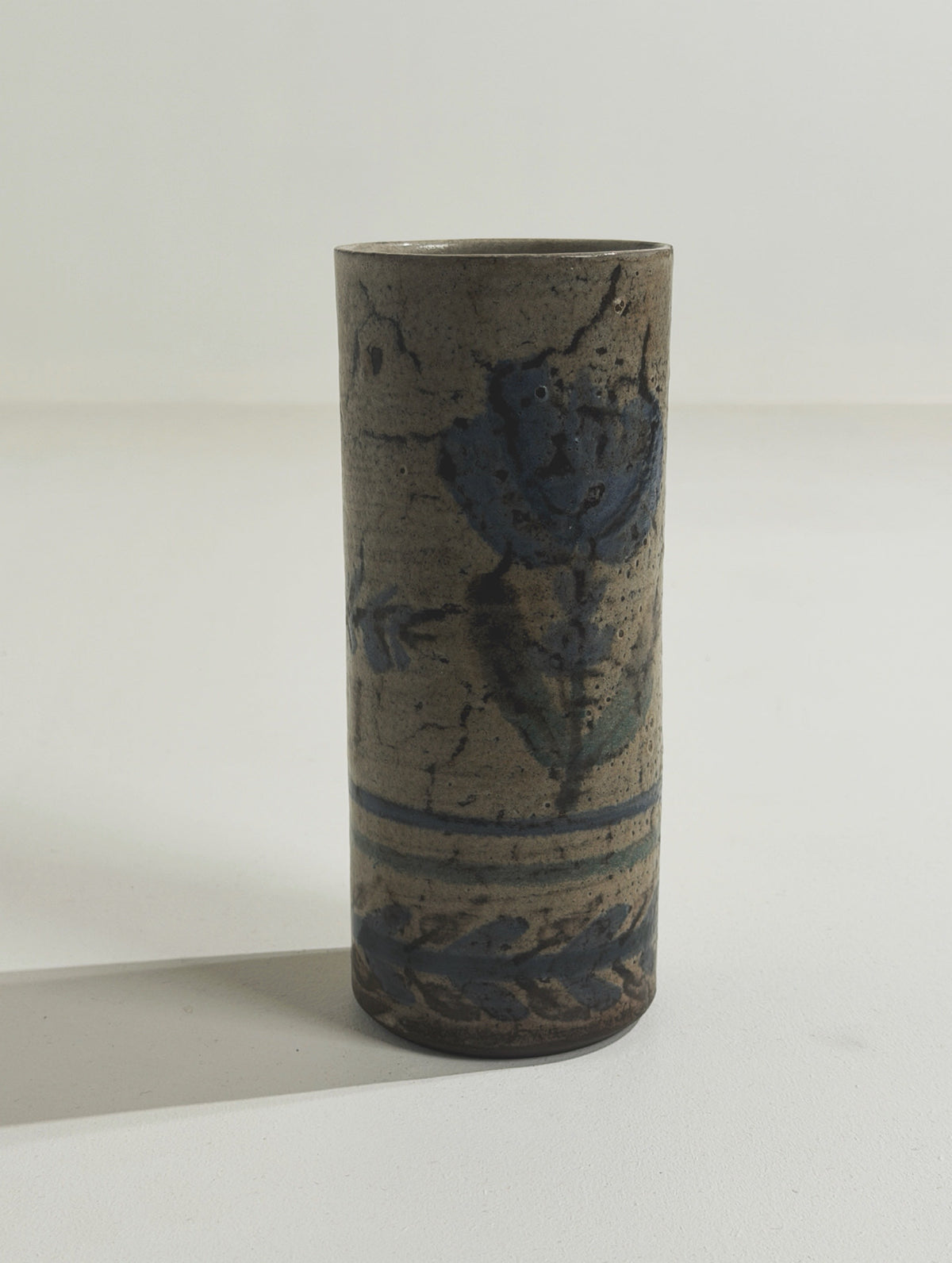 Roller vase by Gustave Reynaud, Atelier Le Mûrier | The Oblist — ceramic, blue floral design