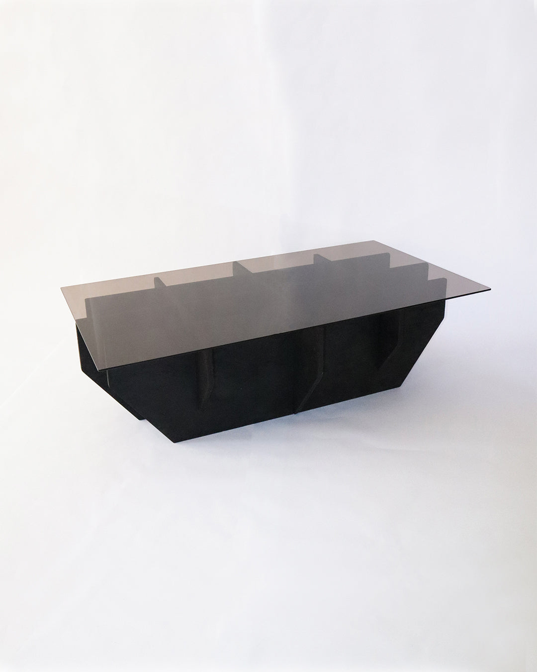 Modern black geometric coffee table with smoked glass top by Arthur Bitsch