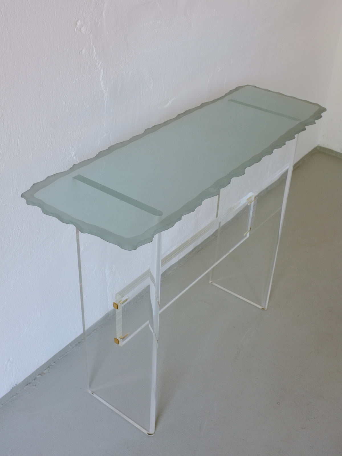 Sculptural glass and lucite console table profile view, Italy 1980s