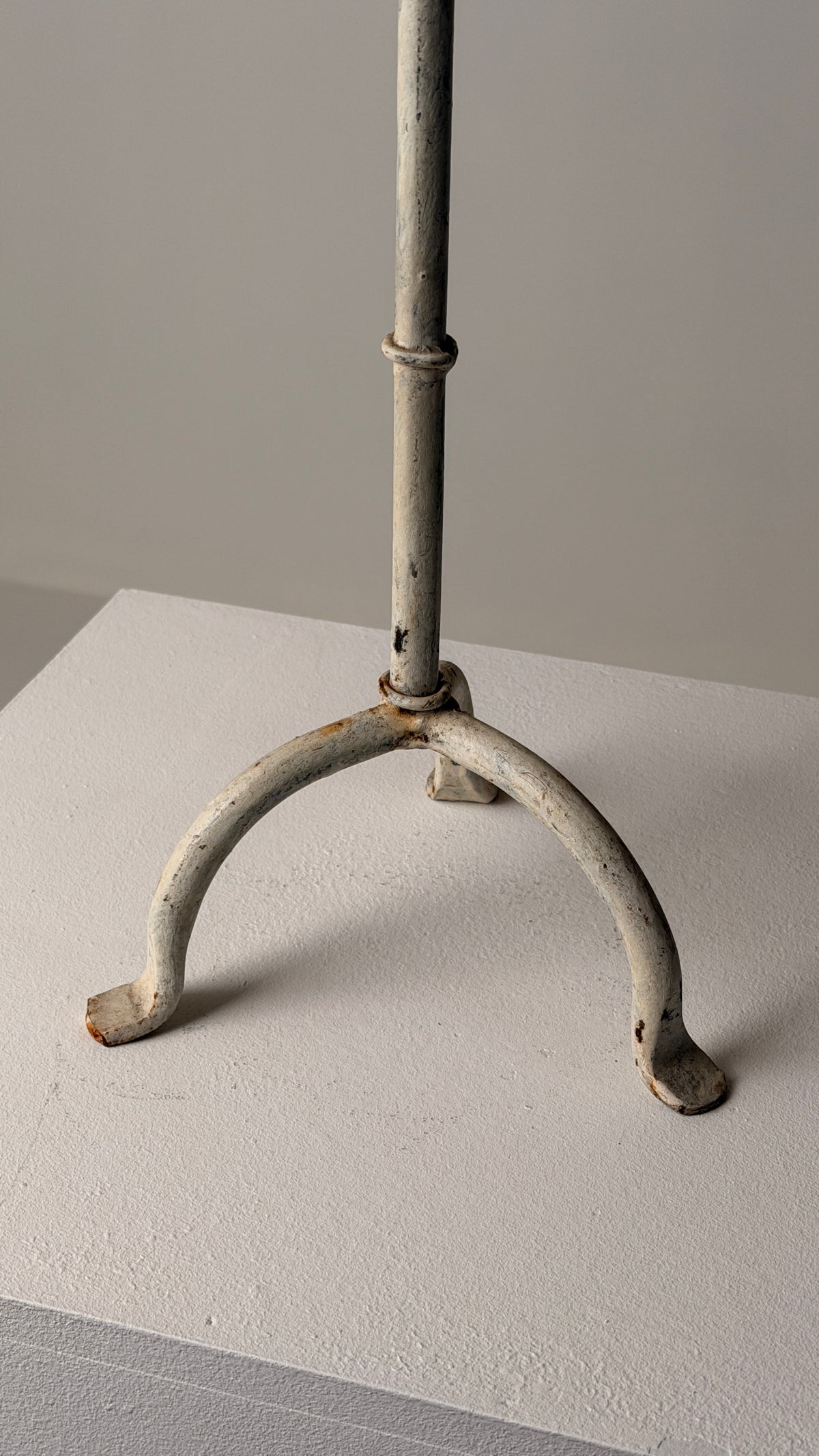 White-patinated Iron Candelabrum, France, early 20th century — close-up of base with textured finish