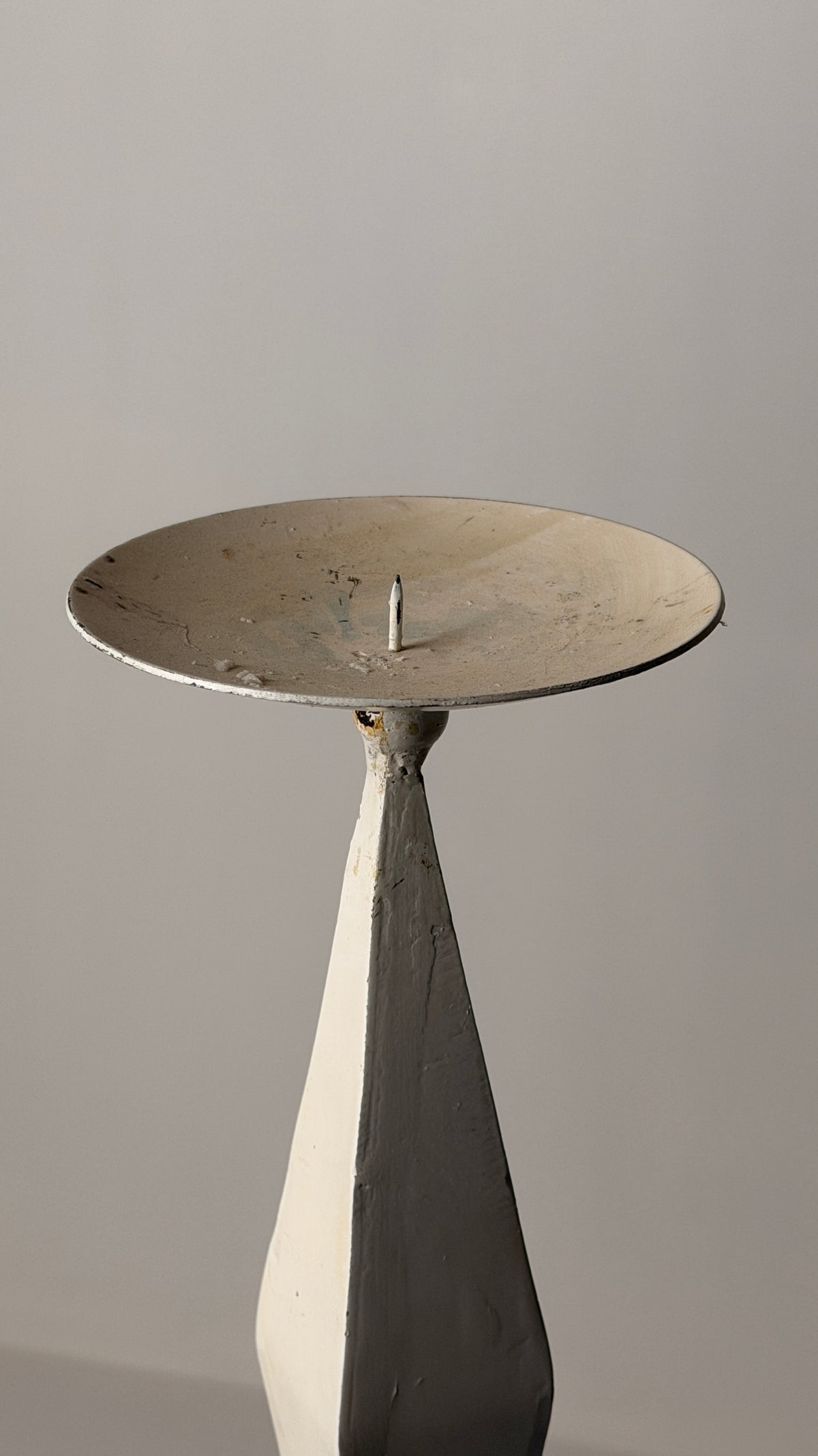 White-patinated Iron Candlestick, France, early 20th century — top view highlighting circular dish and textured surface