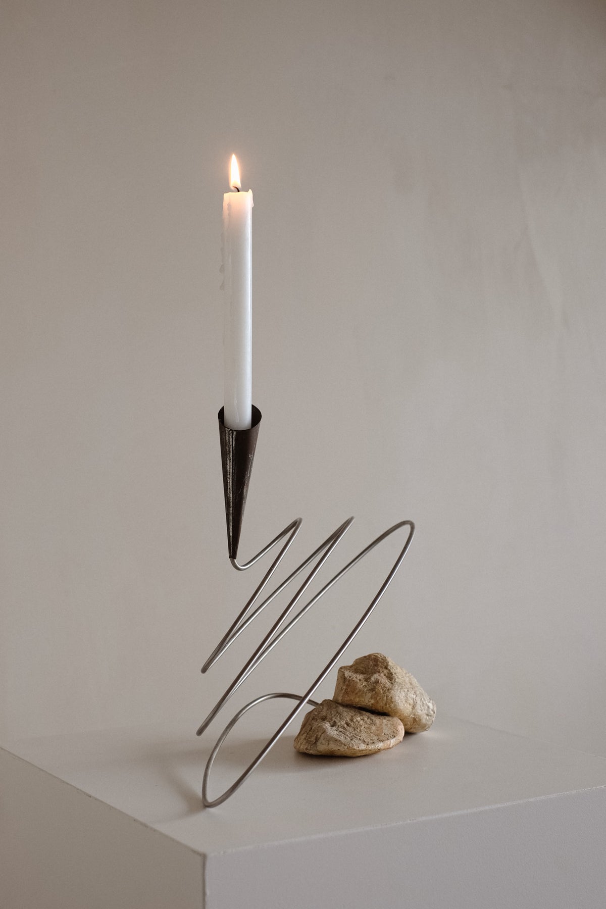 Sculptural Spiral Candle Holder with Stone Base — in context