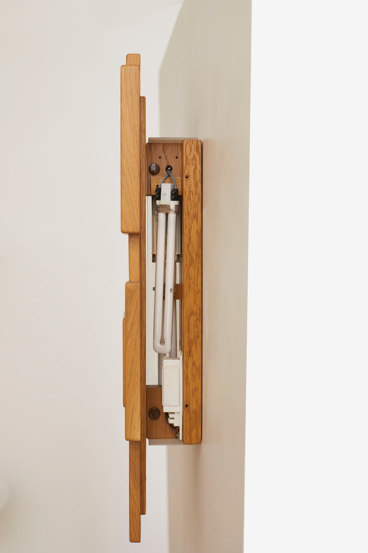 Vintage Set of Two French Oak Wood Sculptural Lamps Wall Lights C. 1980 — side view showing wall-mounted design and light bul