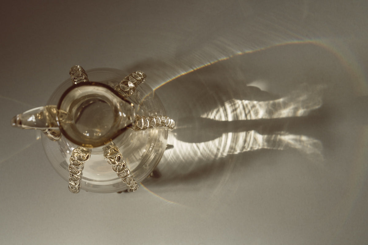 Contemporary Carafes in Glass with ornaments - Mouthblown Collection — top view highlighting glass details and reflections