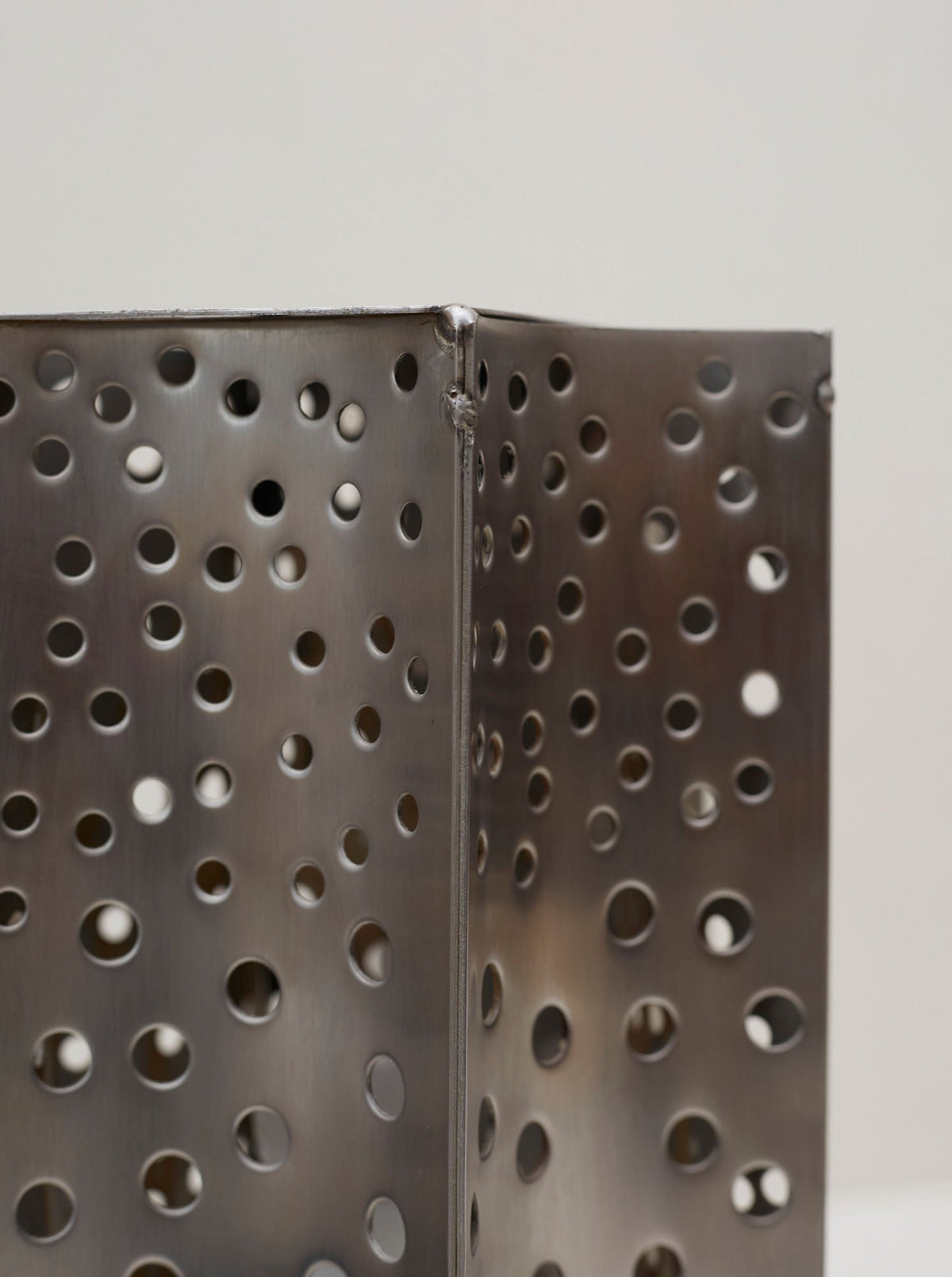 One of a Kind French Artisanal Stainless Steel Table Lamp Vintage Circa 1970 — close-up of perforated stainless steel texture