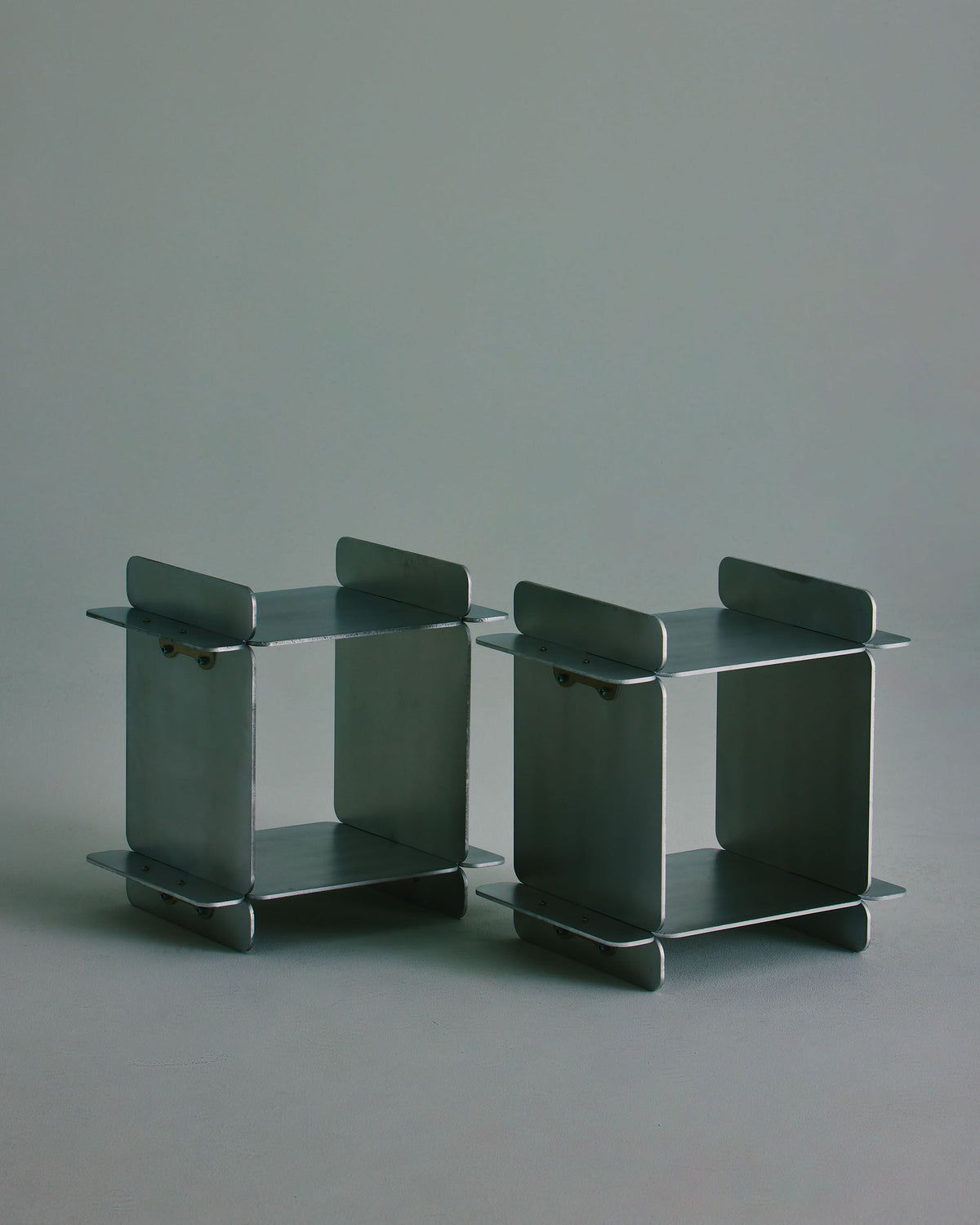 The Side Table — top view of gray metal design